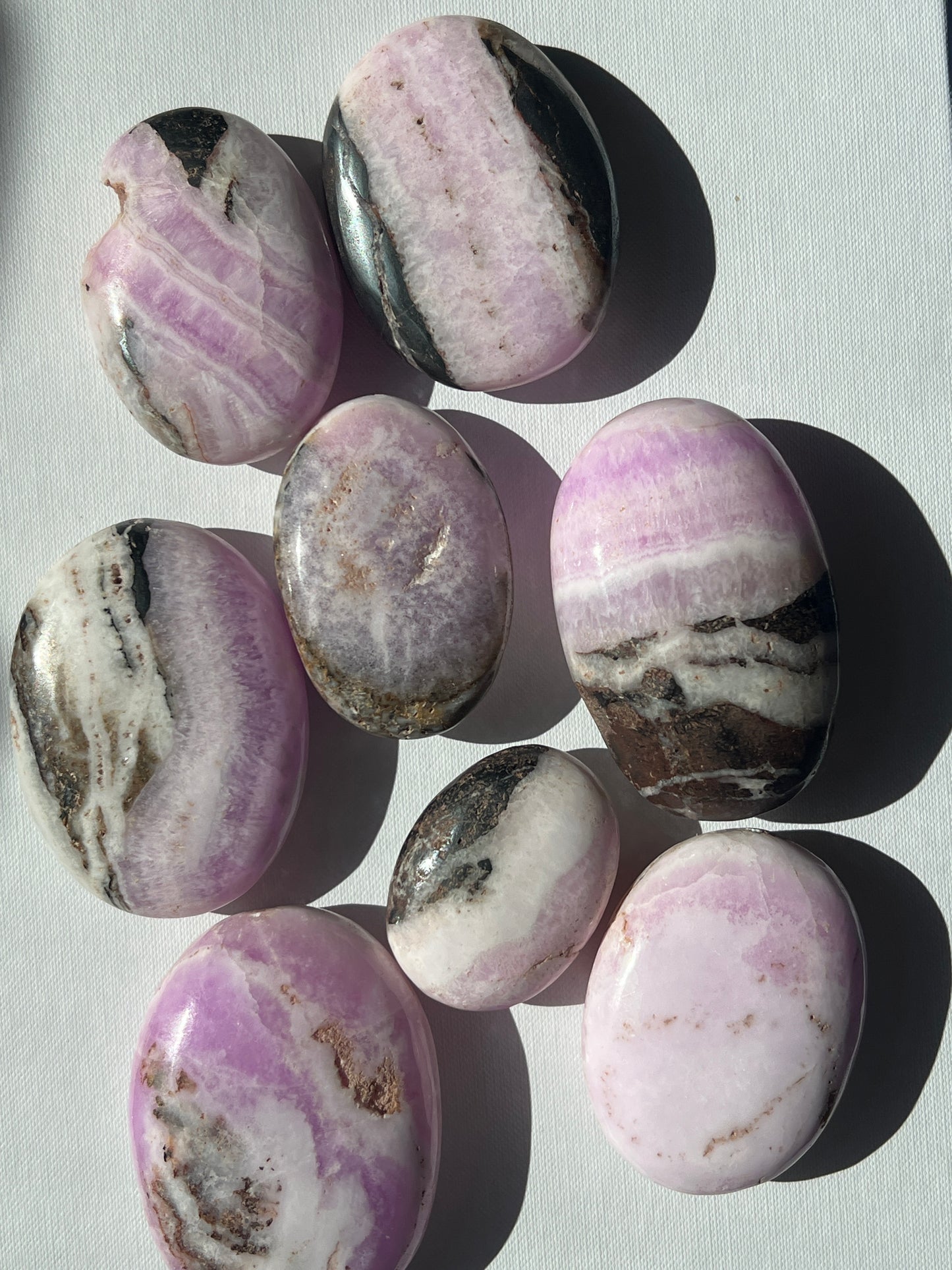 “Witch’s Brew” Pink Aragonite & Hematite Palm Stones