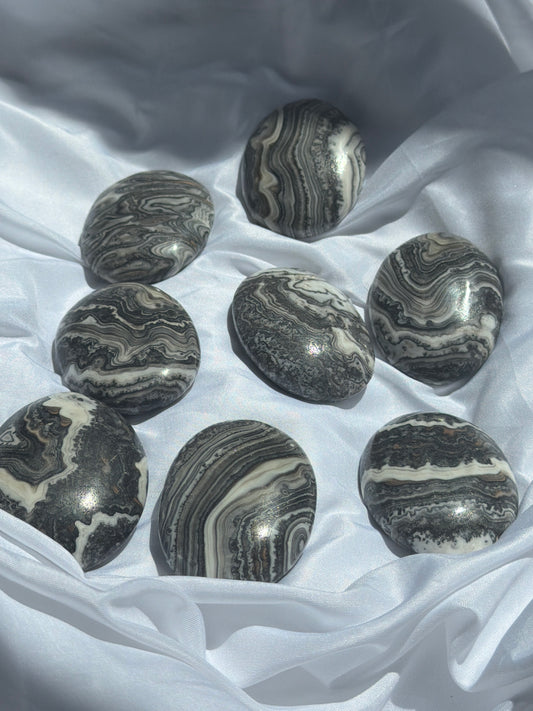 “Fluid Filigree” Mexican Onyx Palm Stones