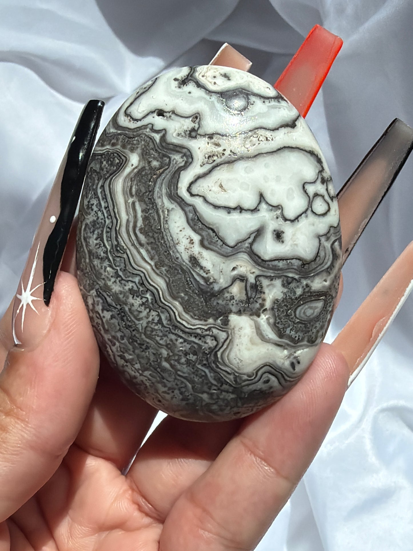 “Fluid Filigree” Mexican Onyx Palm Stones