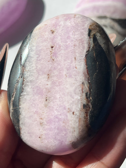 “Witch’s Brew” Pink Aragonite & Hematite Palm Stones